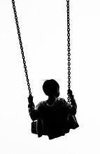 child on swing